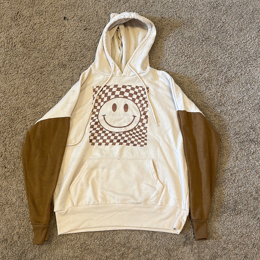 Selling two sweatshirts, grew out of.
